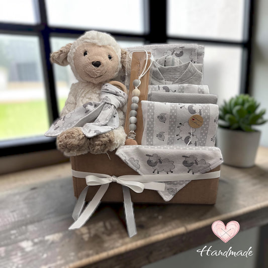 baby gift basket with plush little lamb stuffie bib and burp pads in grey lamb design