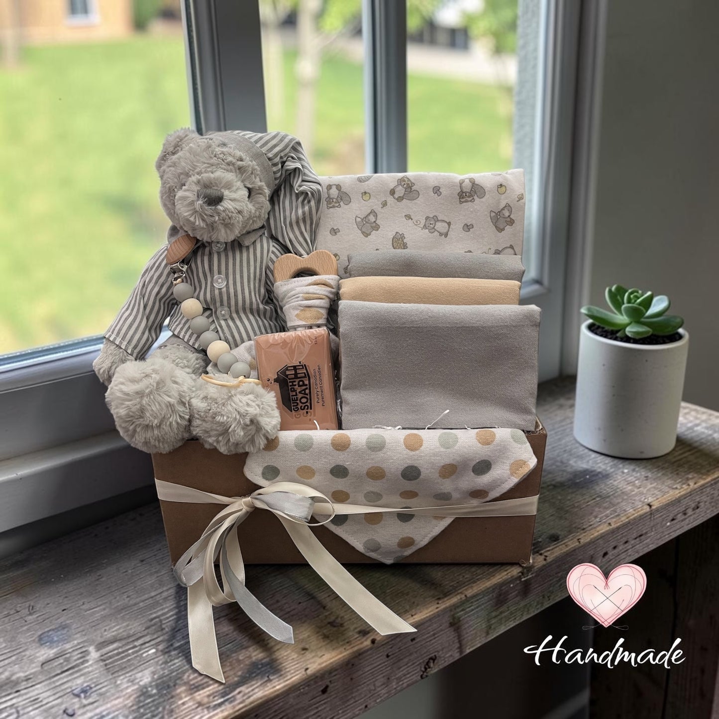 premium unique baby gift with teddy and baby items grey and cream neutral colors