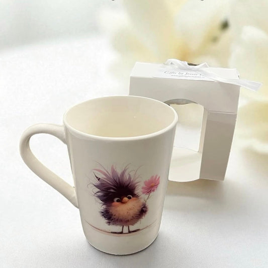 cute purple bird design on a white mug