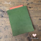 book sleeve green corduroy fabric back with purple flower fabric front handmade in Windsor
