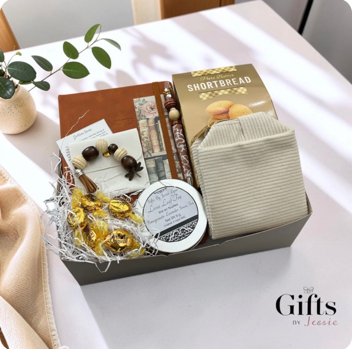 boxed gift set with notebook pen snacks candle pouch bookmark and gratitude beads