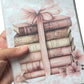 Notebook with clear plastic cover pink stacked books with a pink bow graphic on the front of the notebook