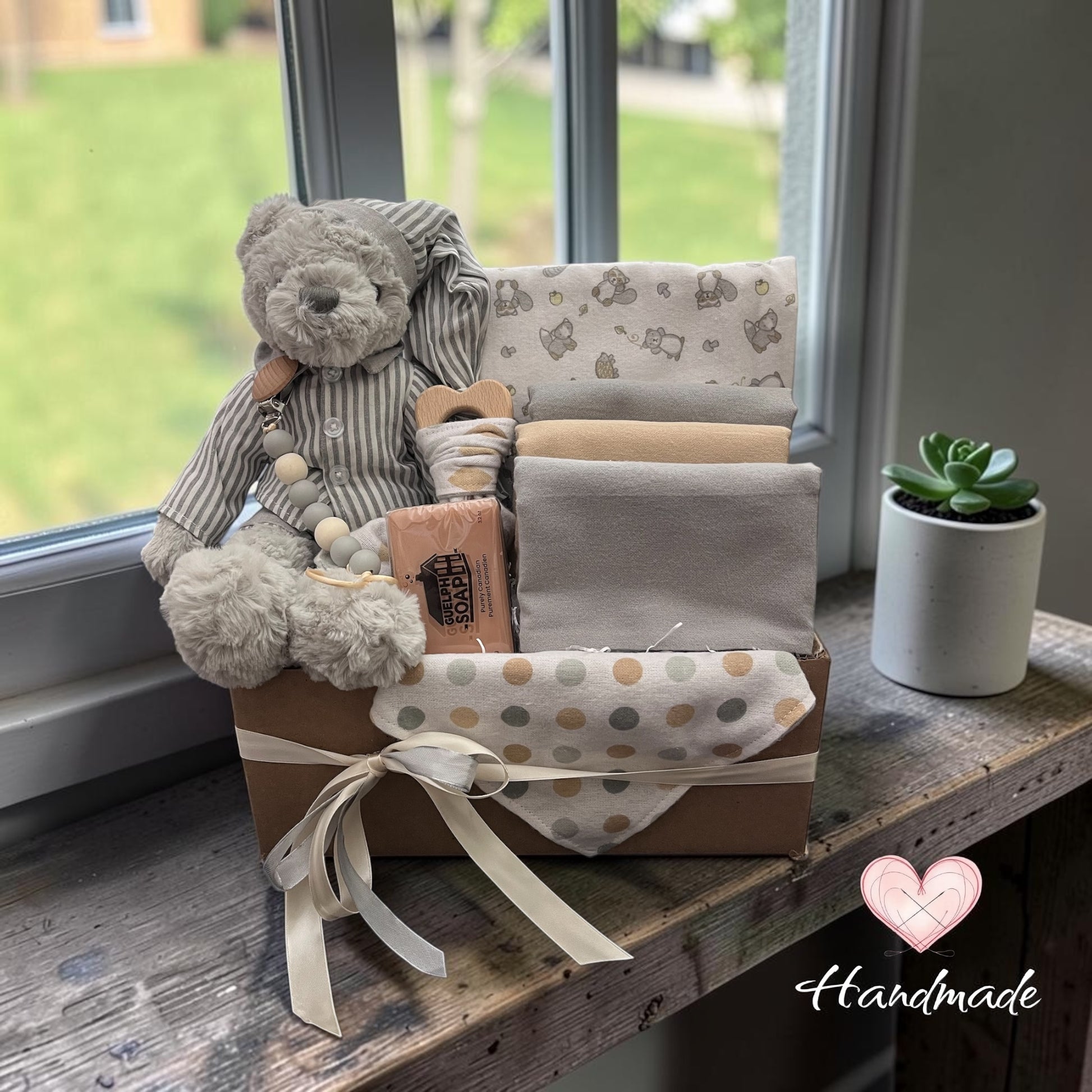 premium unique baby gift with teddy and baby items grey and cream neutral colors