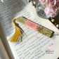handmade pink gold resin bookmark